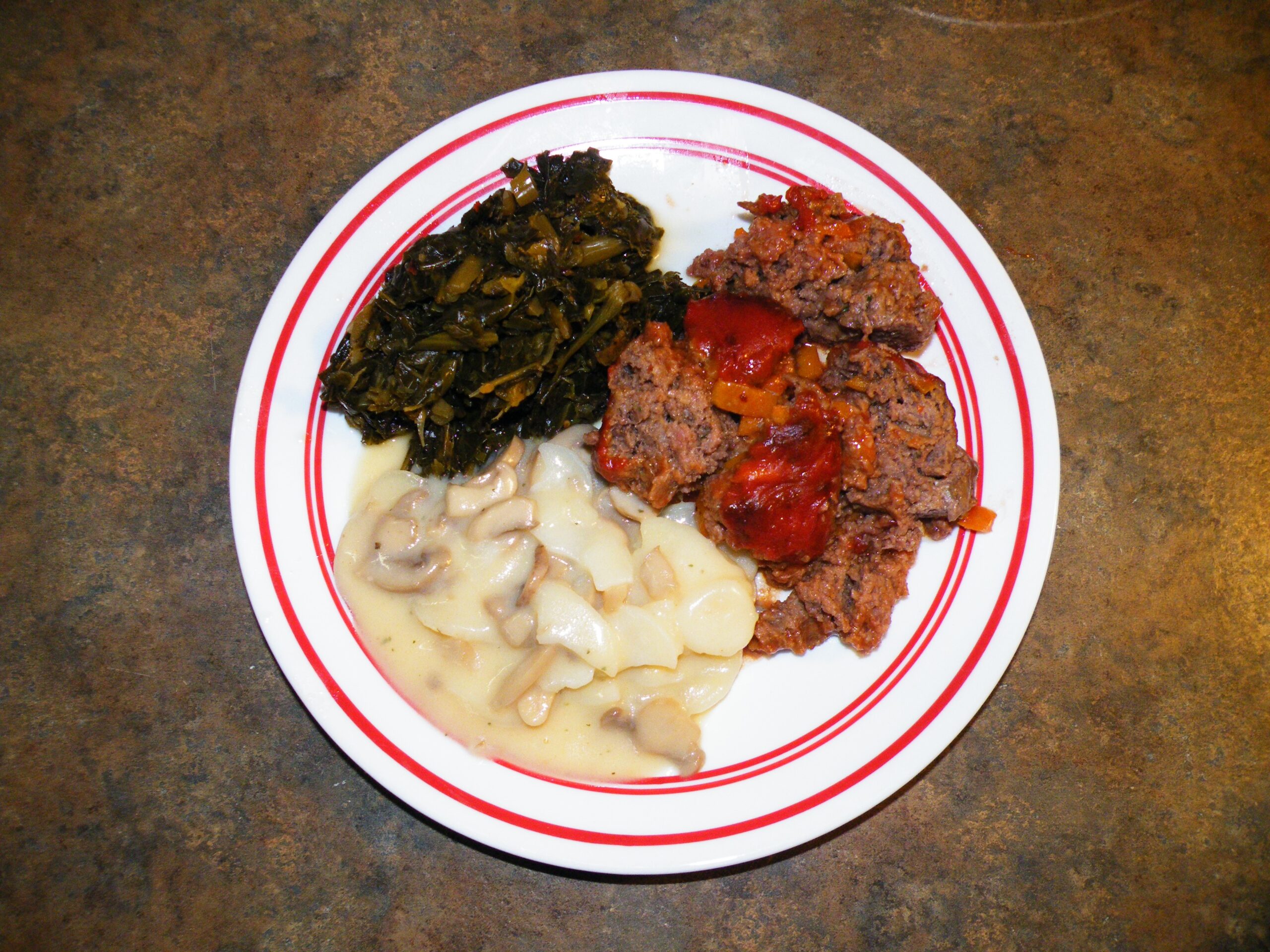 Gypsy Meatloaf with Southern Style Collard Greens and Scallop Potatoes with Mushrooms