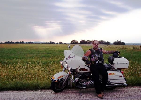 The GYPSY with his 1983 Harley-Davidson FLHT at Tall Grass Prairie 2009
